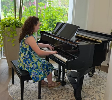 Student performing at a piano